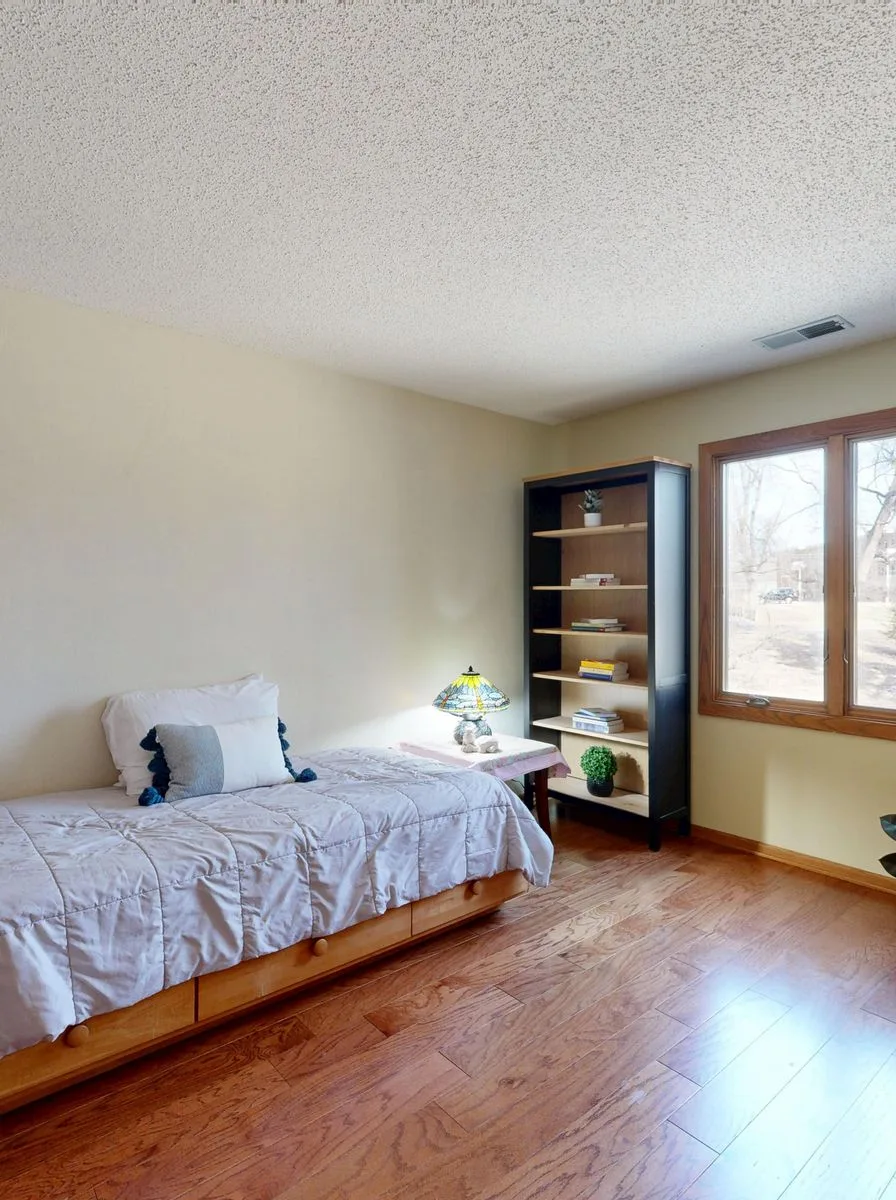 Tiny room glowing with warm layered lamp lighting