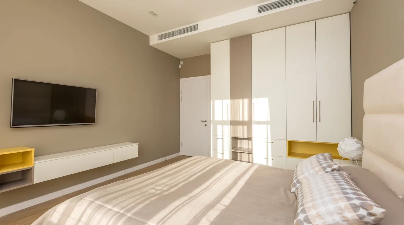 Warm and cozy bedroom with wooden tones