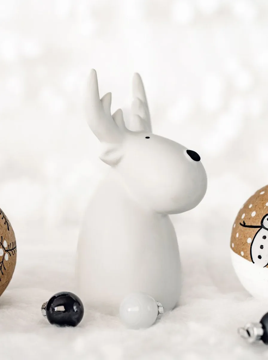 White ceramic reindeer figurine